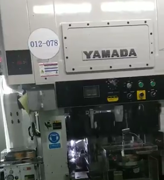 YAMADA punching machine with JoeSure high-speed clip feeder in use
